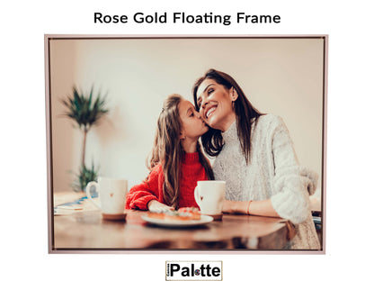 Example Rose Gold floating frame for canvas printed at Canvas Palette. The Photo shows a mom received a kiss of her daughter.