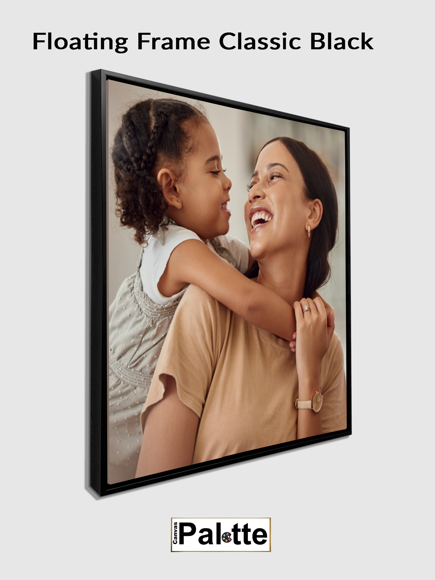 Canvas Palette example of a black floating side frame for canvas framing a portrait of mother and daughter.