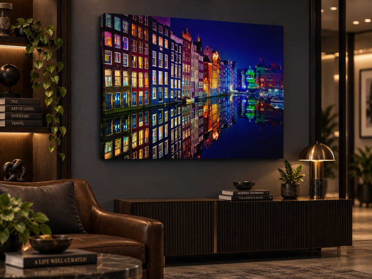 Rows of narrow Amsterdam canal houses glow in red, yellow and blue beside still water — additional artwork view 4